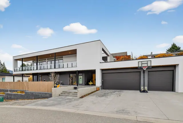 Exterior, modern lake-view home in Lake Country, BC. Real estate photography by Pixel Pro Productions.