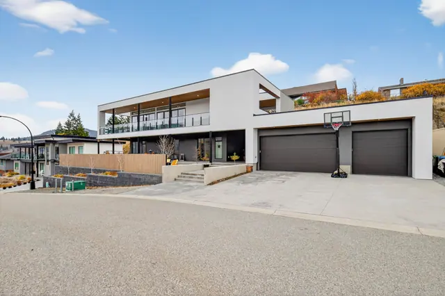 Front exterior, modern lake-view home in Lake Country, BC. Real estate photography by Pixel Pro Productions.