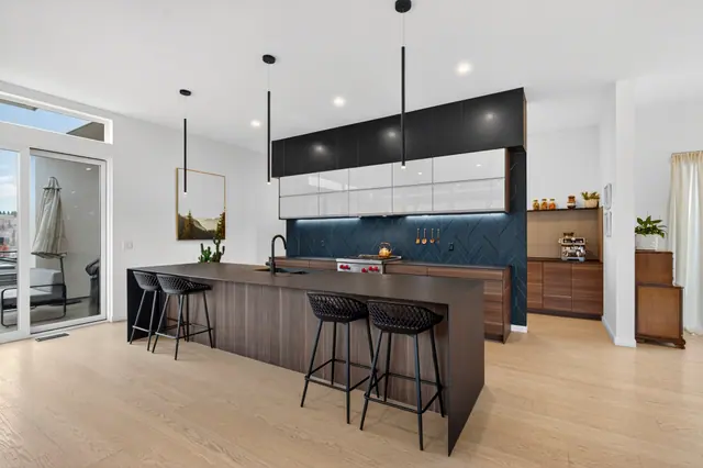 Kitchen, modern lake-view home in Lake Country, BC. Real estate photography by Pixel Pro Productions.