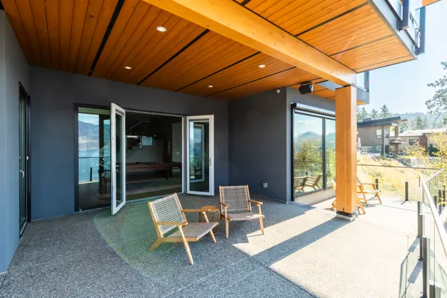 Deck, lake-view modern home in Lakestone, Lake Country, BC. Real estate photography by Pixel Pro Productions.