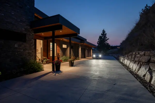 Entry twilight, luxury lake-view home in Lakestone, Lake Country, BC. Real estate photography by Pixel Pro Productions.