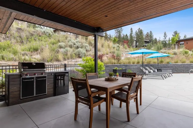 Outdoor kitchen, luxury lake-view home in Lakestone, Lake Country, BC. Real estate photography by Pixel Pro Productions.