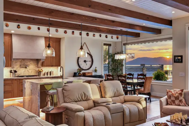 Great room sunset, lakefront home renovation in Lower Mission, Kelowna, BC. Real estate photography by Pixel Pro Productions.