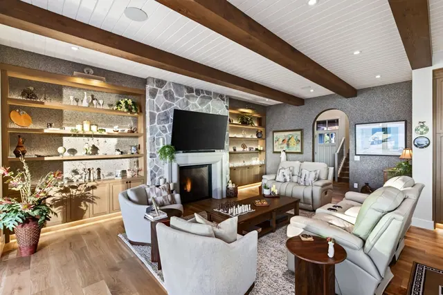 Living room fireplace, lakefront home renovation in Lower Mission, Kelowna, BC. Real estate photography by Pixel Pro Productions.