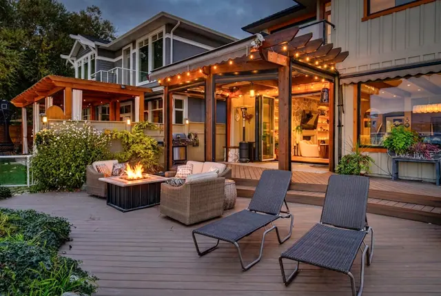 Twilight patio, lakefront home renovation in Lower Mission, Kelowna, BC. Real estate photography by Pixel Pro Productions.