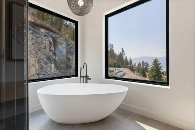 Soaker tub, luxury hillside estate in Vernon, BC. Real estate photography by Pixel Pro Productions.