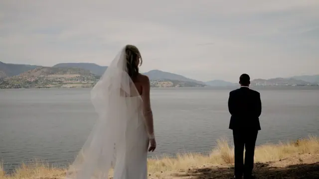 First look lake view: Quinn & Steve's wedding at CedarCreek Estate Winery, Kelowna. Still from the Pixel Pro wedding film.