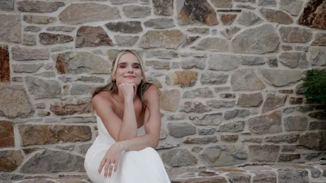 Stone wall portrait: Quinn & Steve's wedding at CedarCreek Estate Winery, Kelowna. Still from the Pixel Pro wedding film.