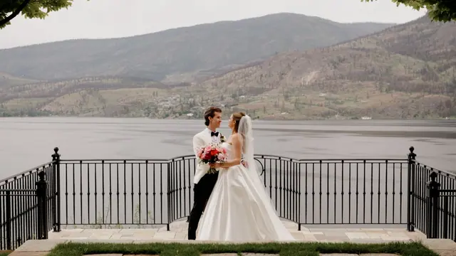 Lakeside railing: Catherine & Matt's wedding at Chateau Okanagan, Kelowna. Still from the Pixel Pro wedding film.