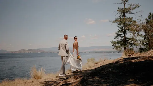 Couple lake view: Bronte & Brett's wedding at Manteo Resort, Kelowna. Still from the Pixel Pro wedding film.