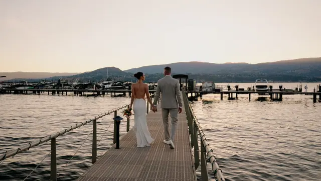 Dock at sunset: Bronte & Brett's wedding at Manteo Resort, Kelowna. Still from the Pixel Pro wedding film.