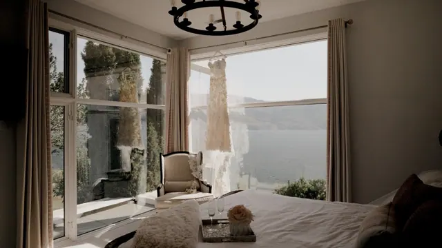 Lake view suite: Laurie & Brad's wedding at Vows and Vines, Summerland. Still from the Pixel Pro wedding film.