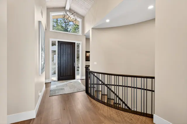 Entry, lake-view family home in West Kelowna, BC. Real estate photography by Pixel Pro Productions.