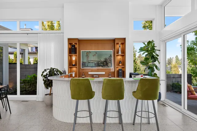 Bar seating, mid-century modern home in West Kelowna, BC. Real estate photography by Pixel Pro Productions.