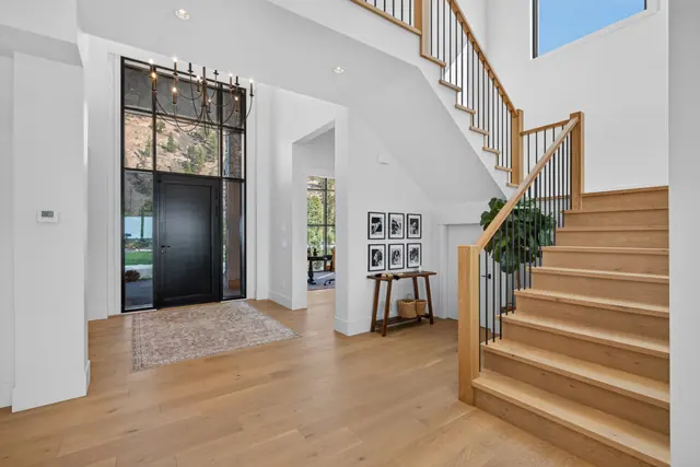 Entry staircase, modern farmhouse new build in West Kelowna, BC. Real estate photography by Pixel Pro Productions.