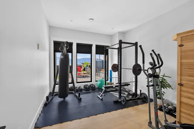 Home gym, modern farmhouse new build in West Kelowna, BC. Real estate photography by Pixel Pro Productions.