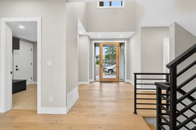 Entry, new-build lake-view home in West Kelowna, BC. Real estate photography by Pixel Pro Productions.