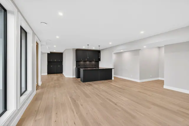 Lower level, new-build lake-view home in West Kelowna, BC. Real estate photography by Pixel Pro Productions.